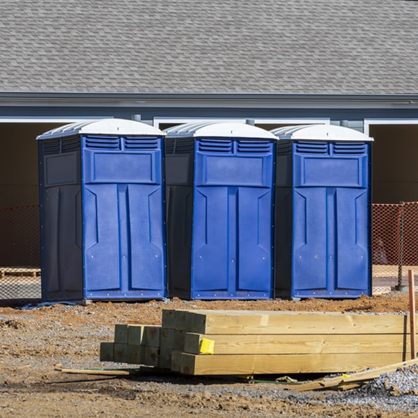 what is the cost difference between standard and deluxe porta potty rentals in Monessen Pennsylvania